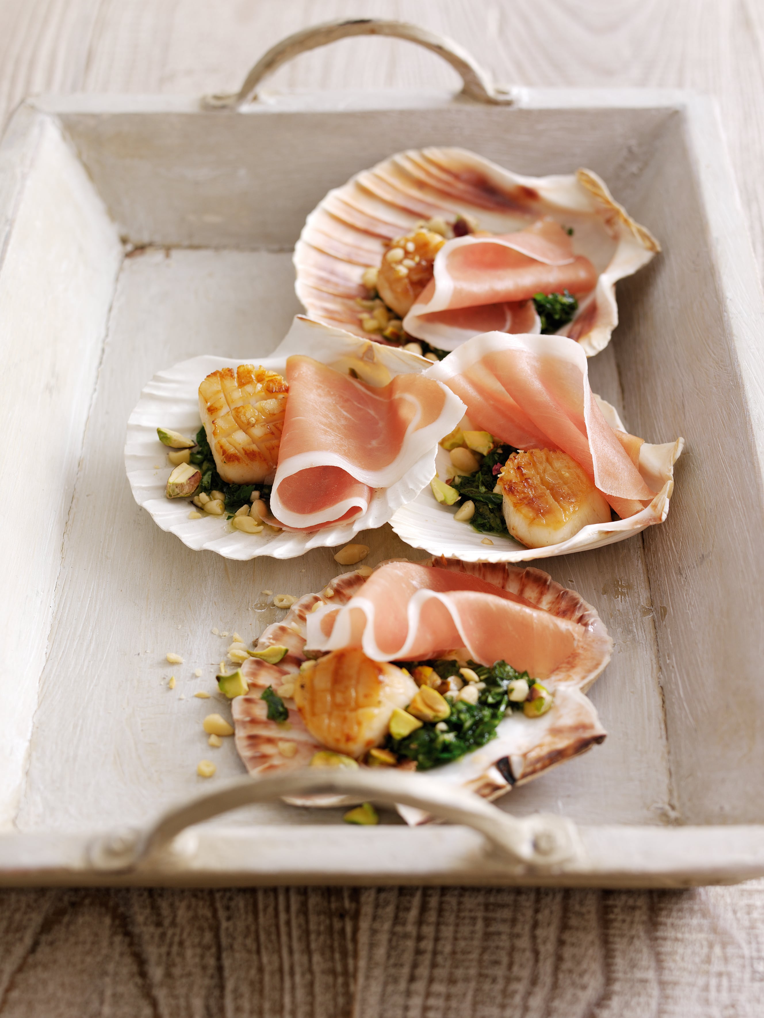 Parma Ham with seared scallips, pistachios and gremolata