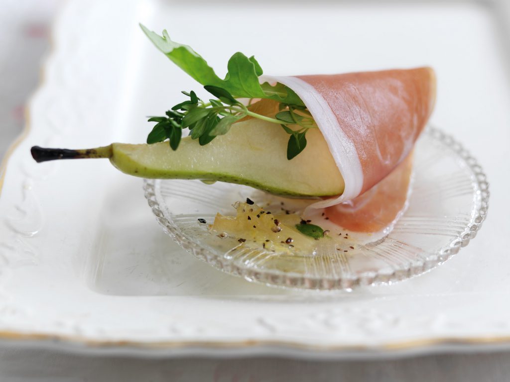 Involtini di Prosciutto di Parma, pere, zenzero e rucola con vodka e limone