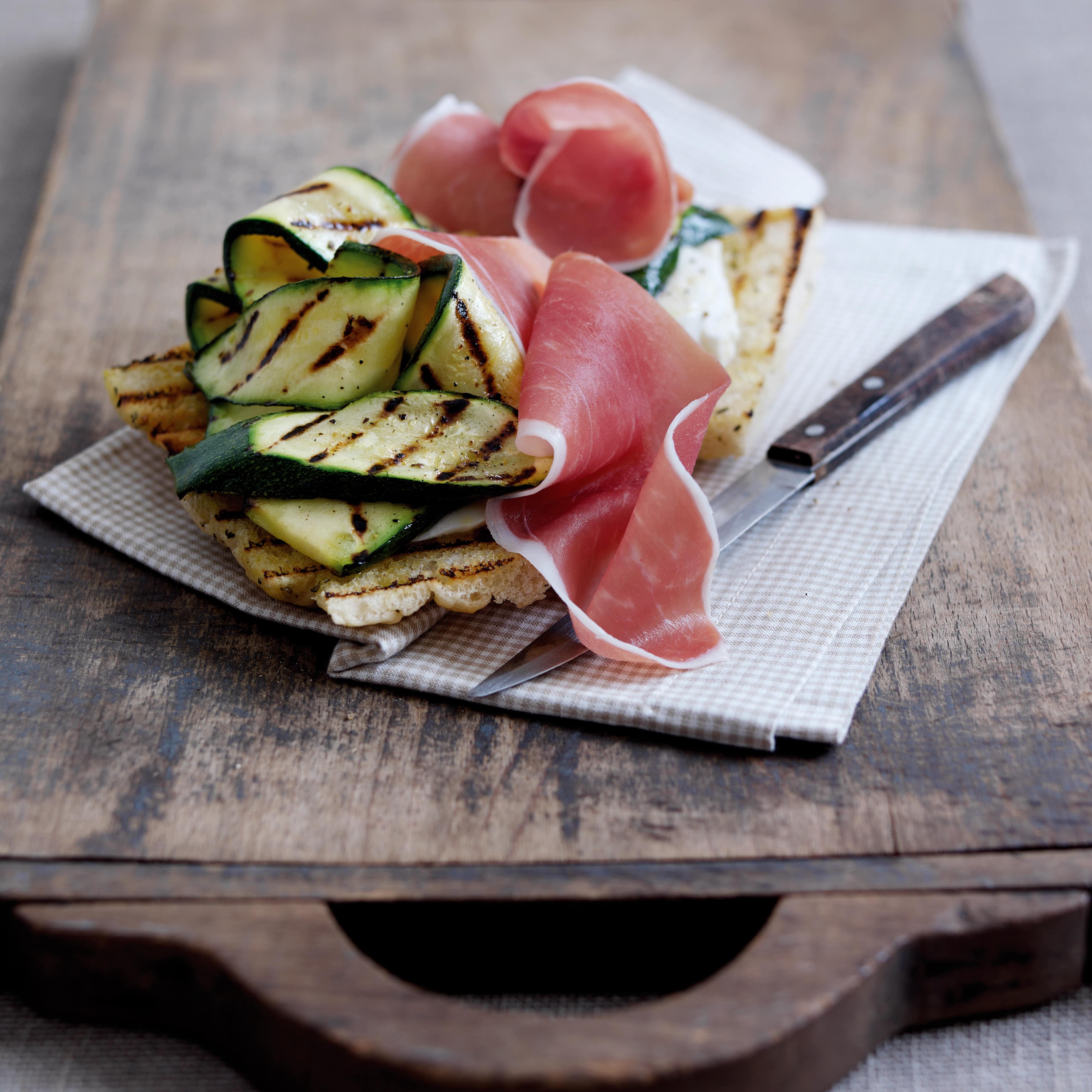 Hot focaccia sandwich with Parma Ham and melting mozzarella