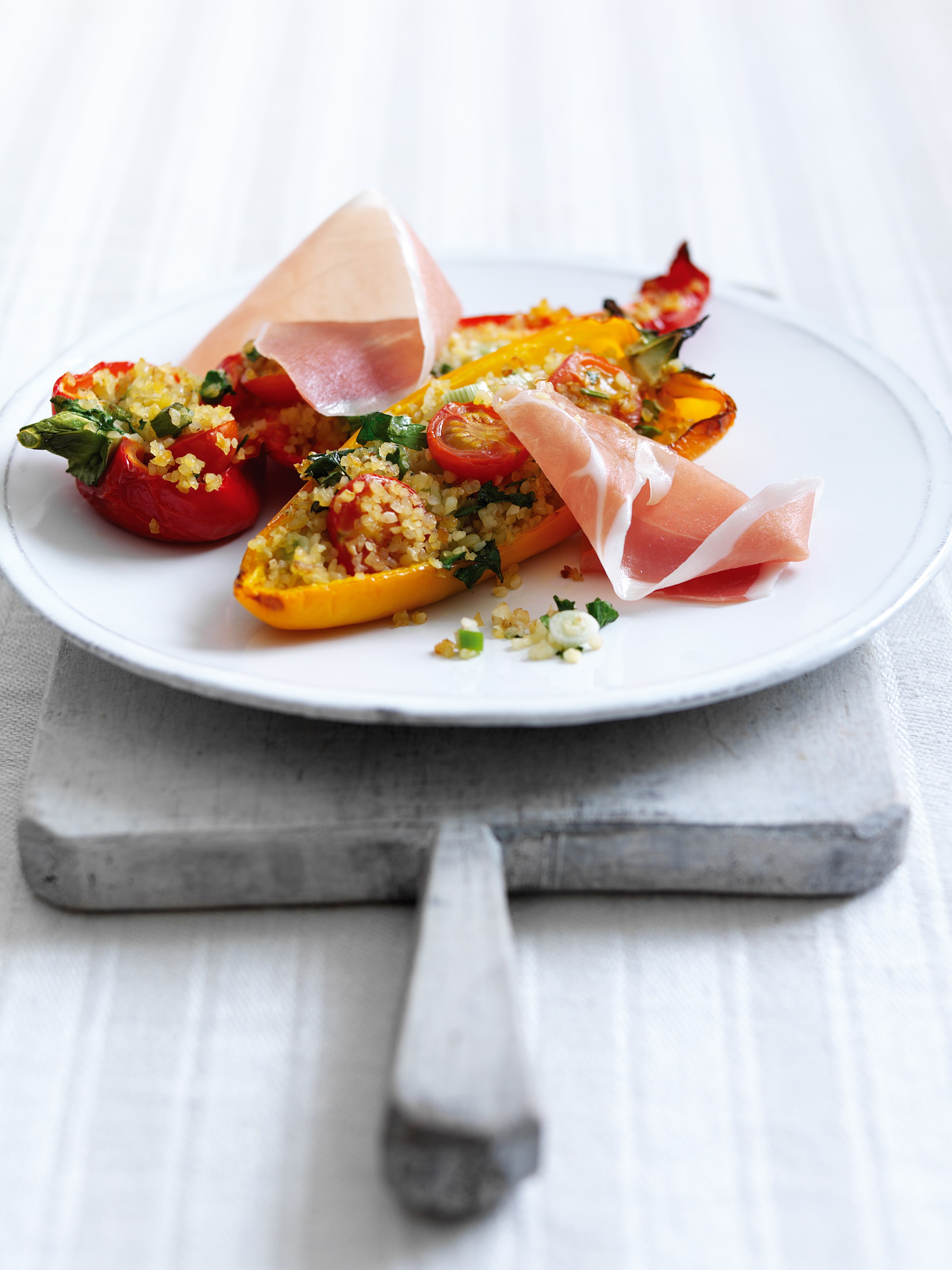 Roasted Stuffed Spicy Peppers with Parma Ham and cherry tomatoes