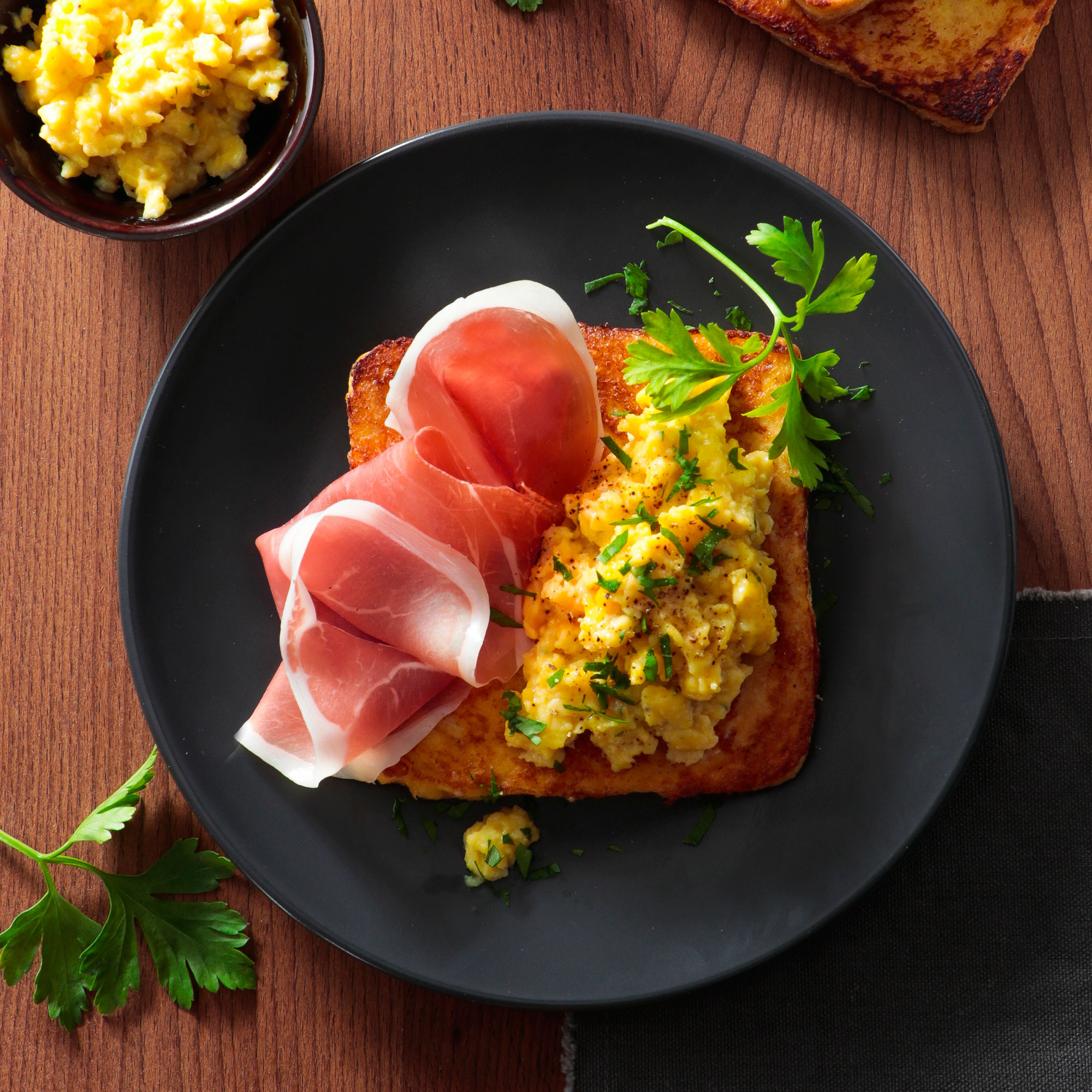 Savoury French toast with Prosciutto di Parma and scrambled eggs